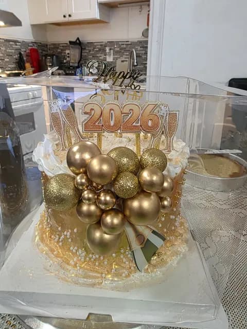 Pastel de cupcakes hecho a mano por Andryana's Sweet Studio